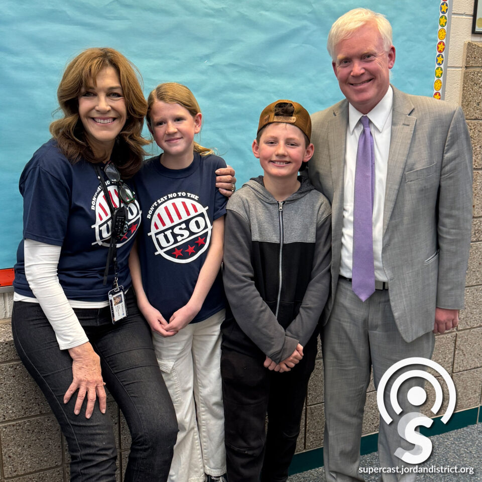 Superintendent with students from the USO performance