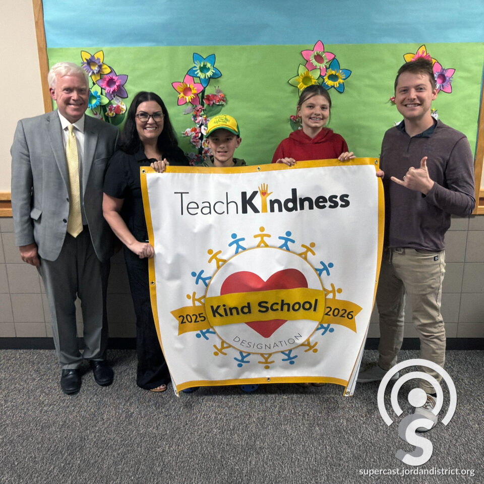 Superintendent with Daybreak students and staff