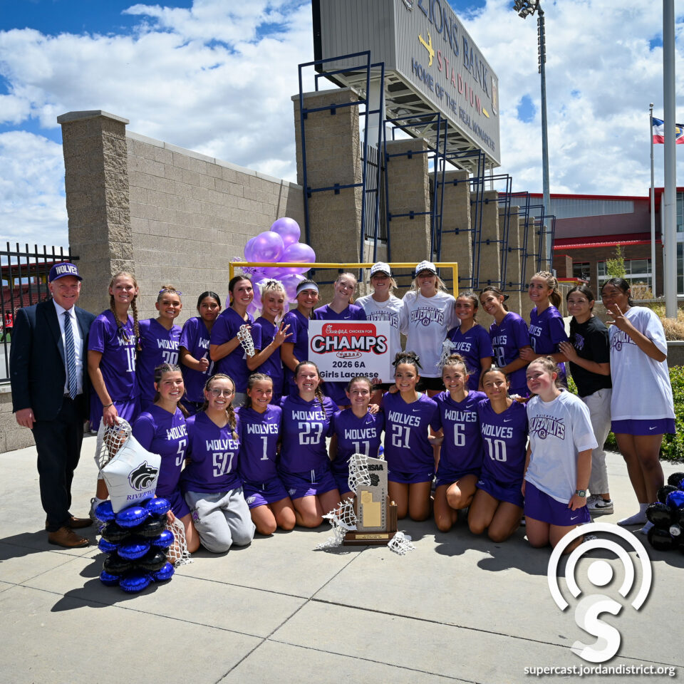 Superintendent with the RHS Girls Lacrosse Team